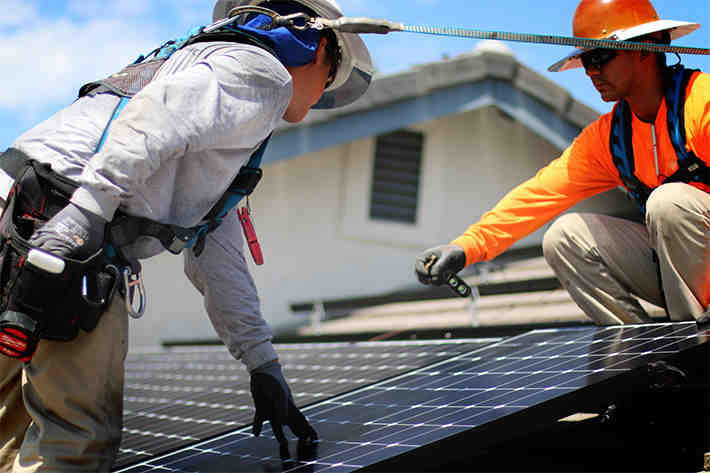 What is the cost for installation of 100 KW solar plant?